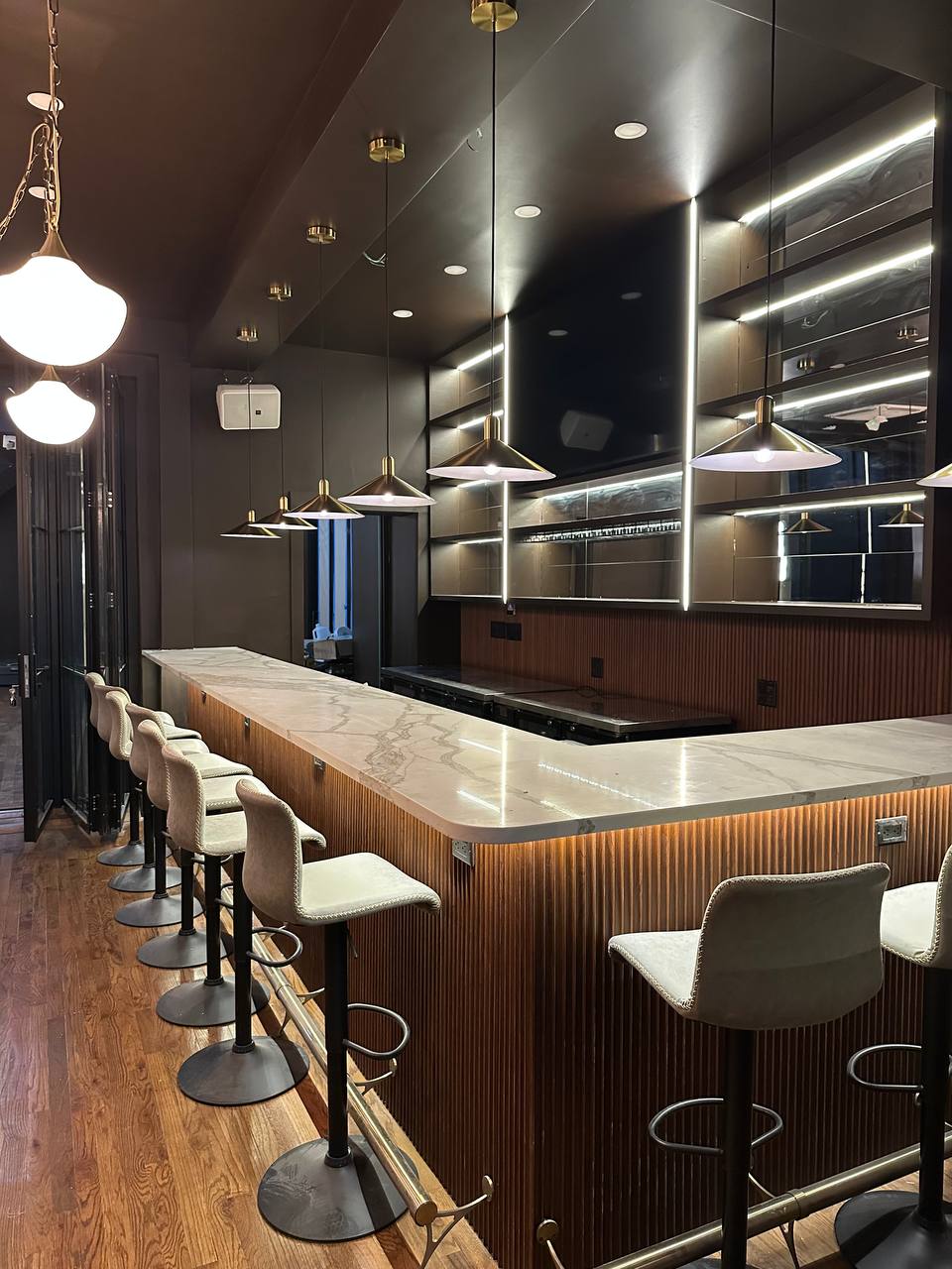 AURA marble bar and intimate lounge seating