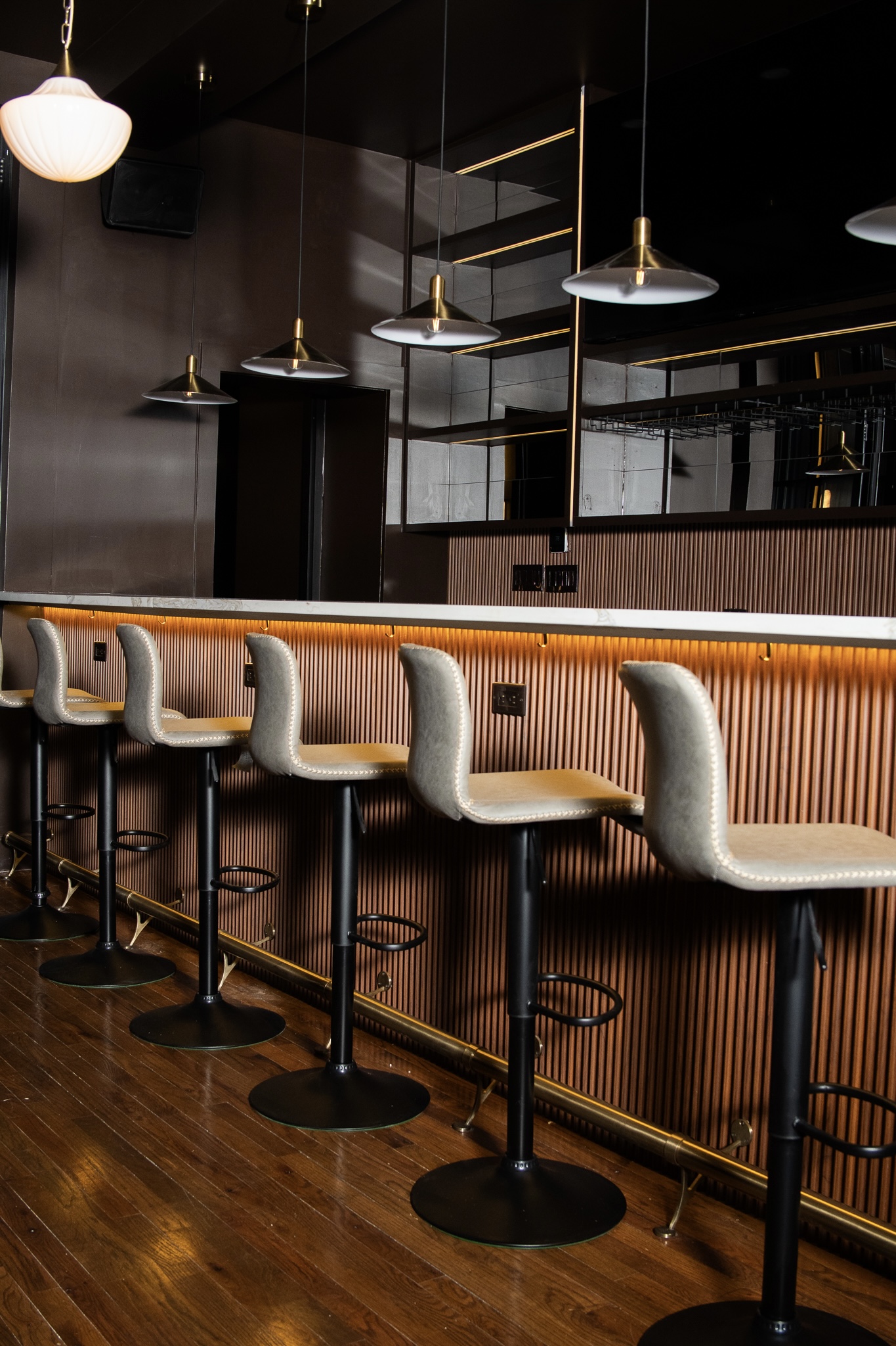 AURA architectural wall panels with gold trim