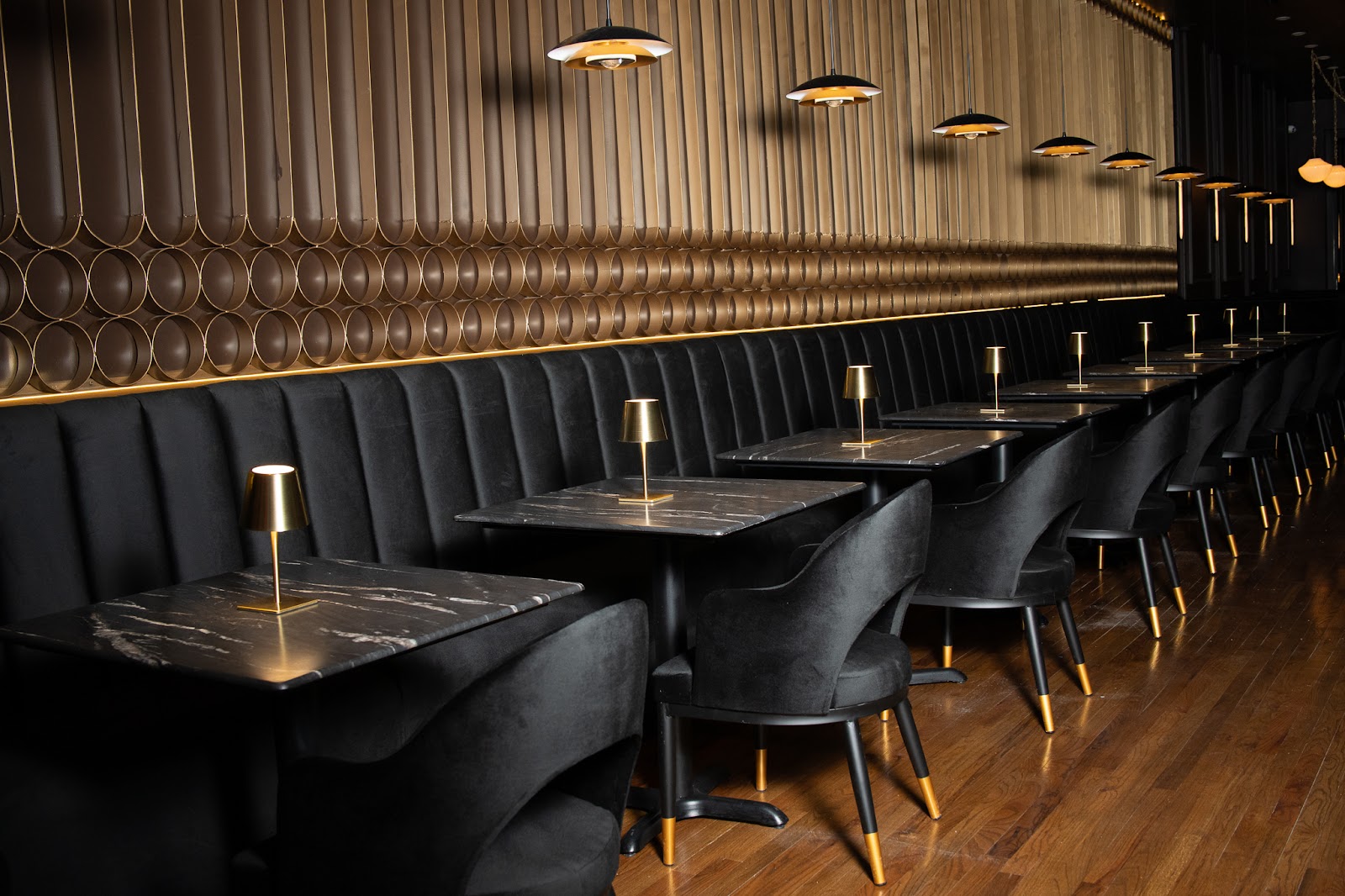 AURA long banquette and ambient lighting rhythm